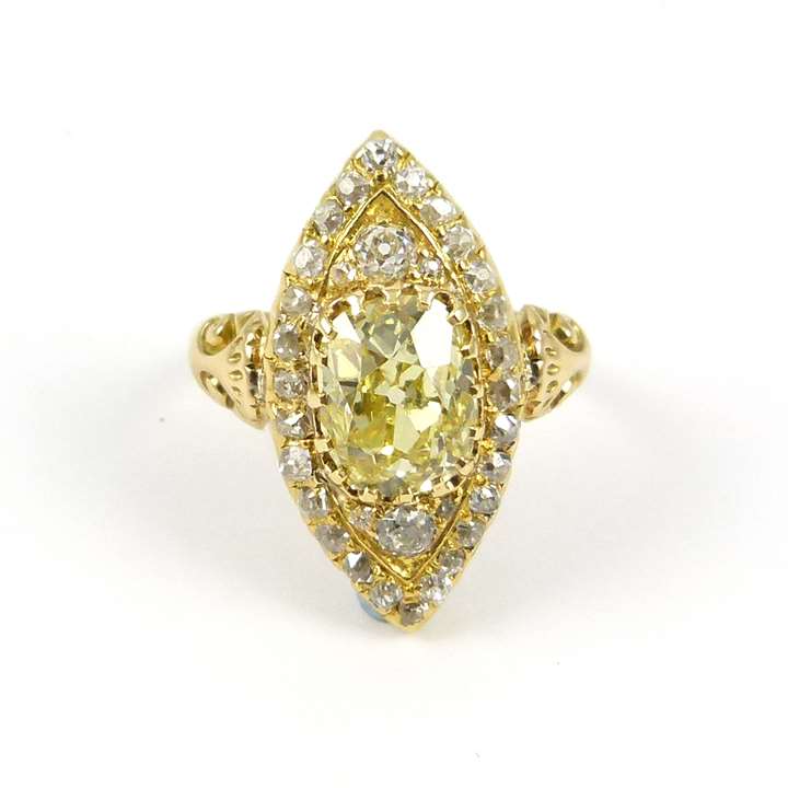 Antique yellow diamond and diamond cluster ring c.1890, the central cushion cut yellow diamond 2.49ct to a marquise shaped border,